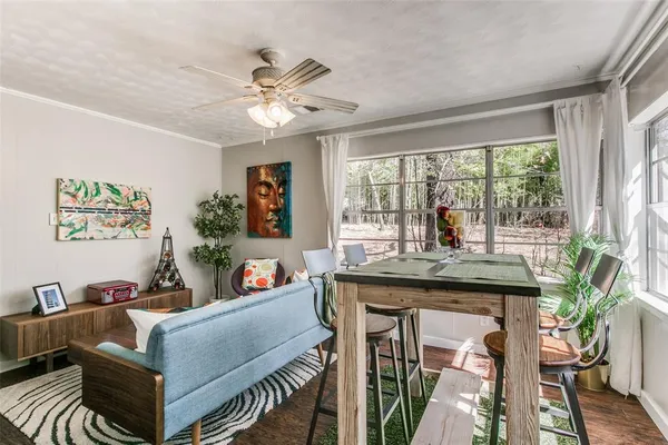 a bathroom with a sink and a curtain