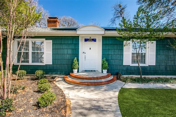 a view of a garden with an outdoor space