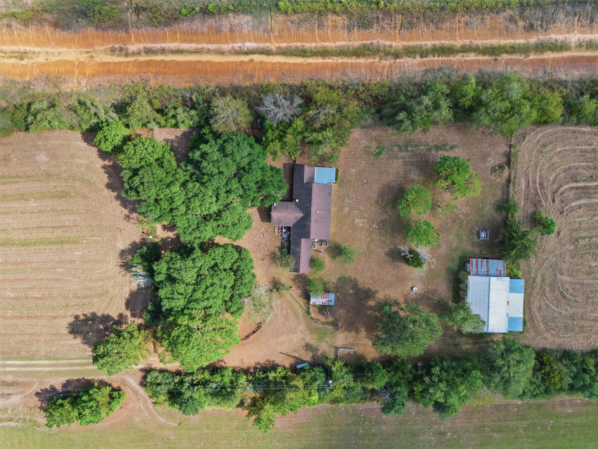 29211 Castle Road Waller, TX 77484 - Photo 3 of 21 an aerial view of a house with a yard and lake view