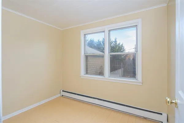 a view of a room with a window