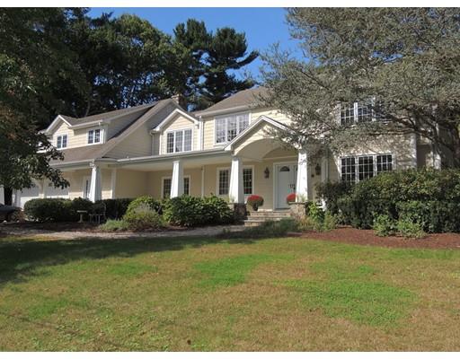 13 Snow Fields Road Mattapoisett, MA 02739 - Photo 1 of 24 a front view of a house with a yard