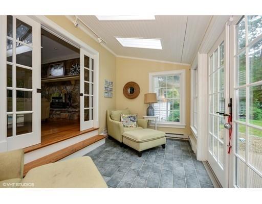 13 Snow Fields Road Mattapoisett, MA 02739 - Photo 12 of 24 a living room with furniture and a large window