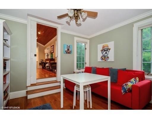 13 Snow Fields Road Mattapoisett, MA 02739 - Photo 20 of 24 a living room with furniture and paintings on the wall