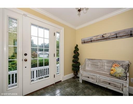 13 Snow Fields Road Mattapoisett, MA 02739 - Photo 4 of 24 a view of a porch with furniture