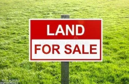 a sign broad in front of a building