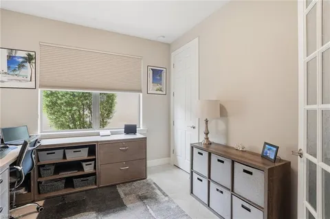 a room with a window and a table in it