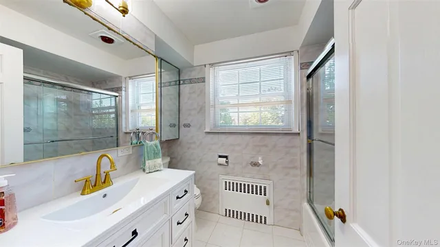 a bathroom with a sink and a bathtub