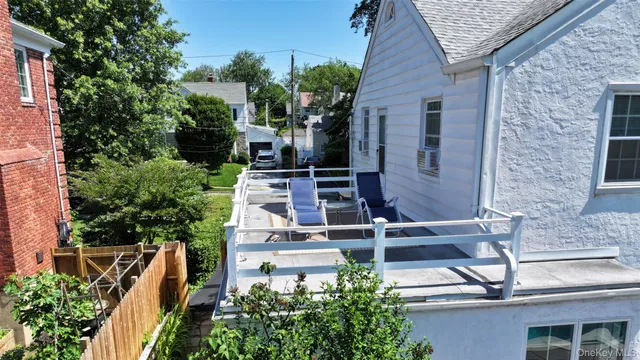 a view of a house with a street