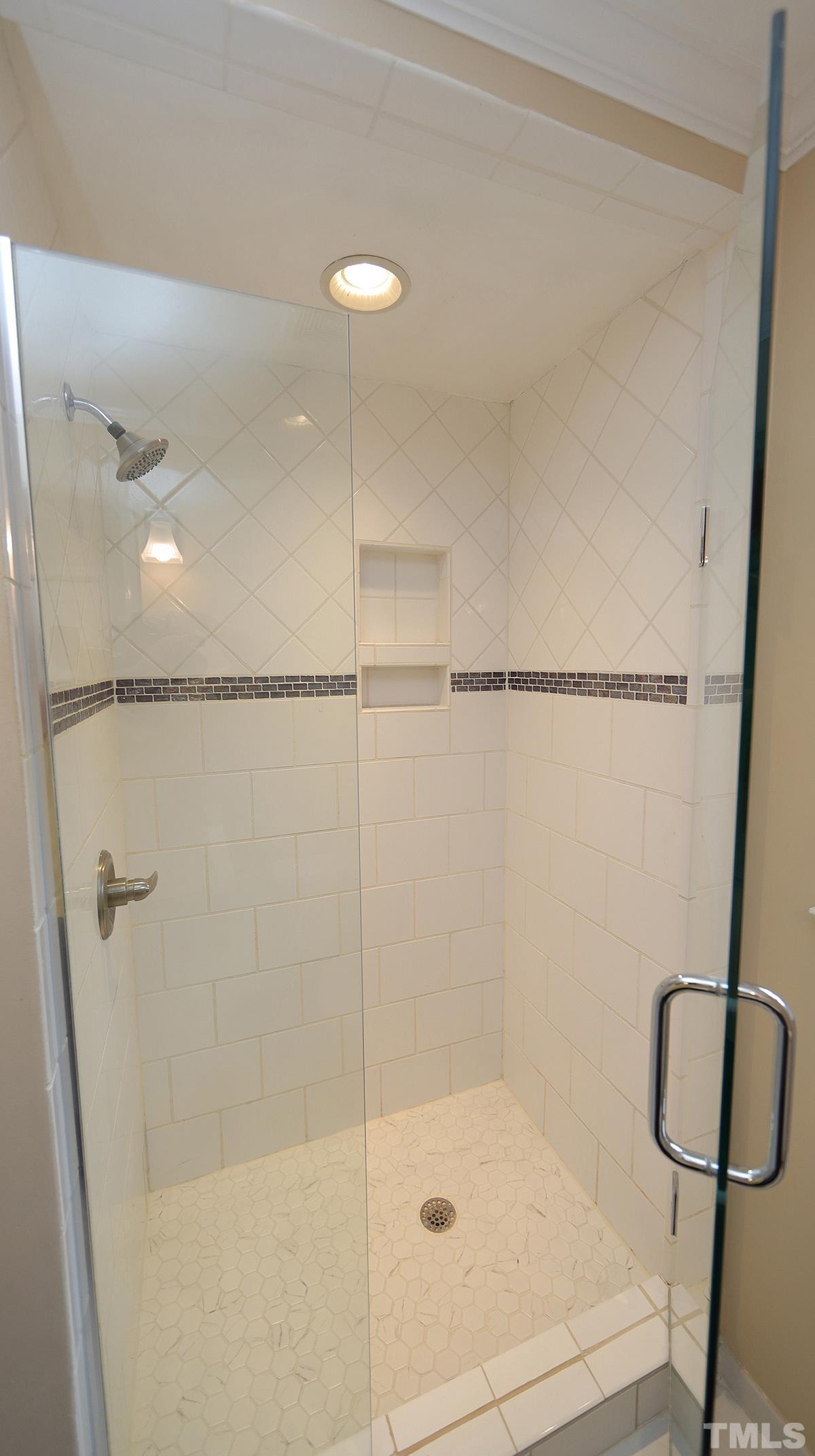 1104 Sapling Place Raleigh, NC 27615 - Photo 11 of 19 a bathroom with a shower