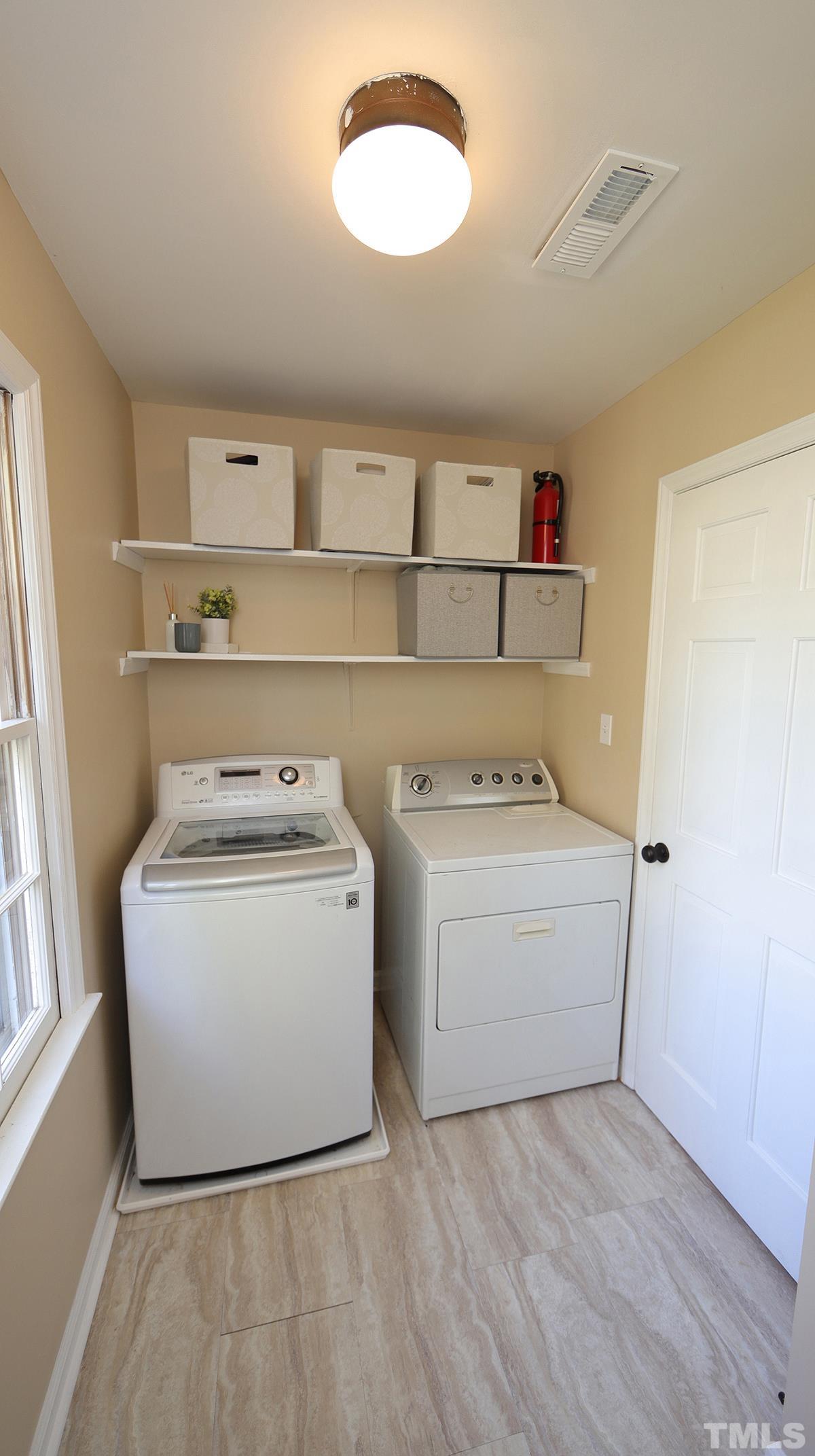 1104 Sapling Place Raleigh, NC 27615 - Photo 14 of 19 a utility room with dryer and washer