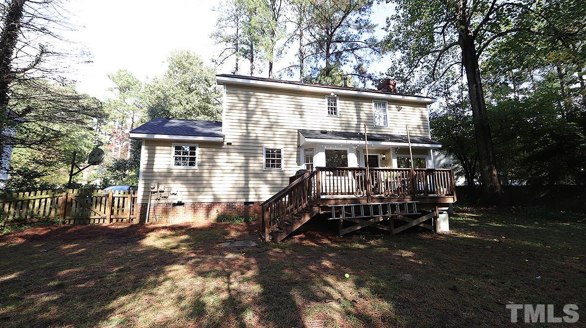 1104 Sapling Place Raleigh, NC 27615 - Photo 17 of 19 a view of a house with a yard