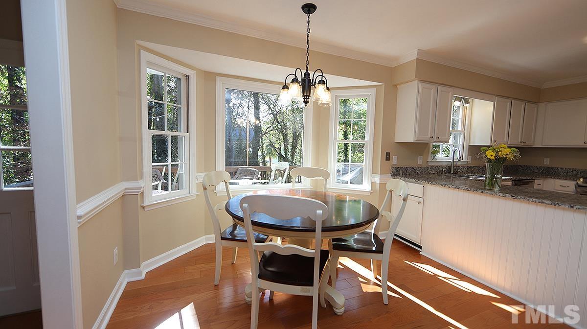 1104 Sapling Place Raleigh, NC 27615 - Photo 4 of 19 a dining room with furniture and window