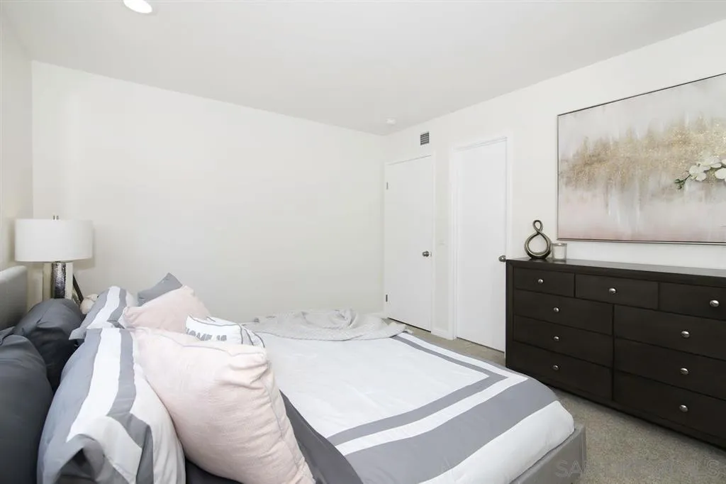 14425 Range Park Road Poway, CA 92064 - Photo 12 of 25 a bedroom with a bed and a painting on the wall