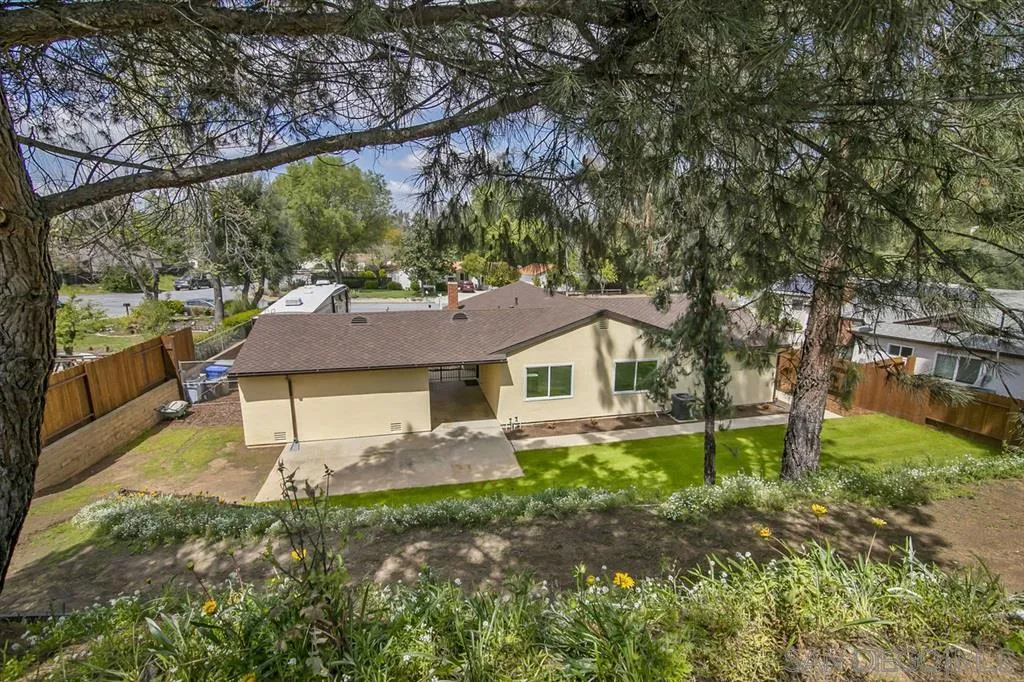 14425 Range Park Road Poway, CA 92064 - Photo 23 of 25 a front view of a house with garden