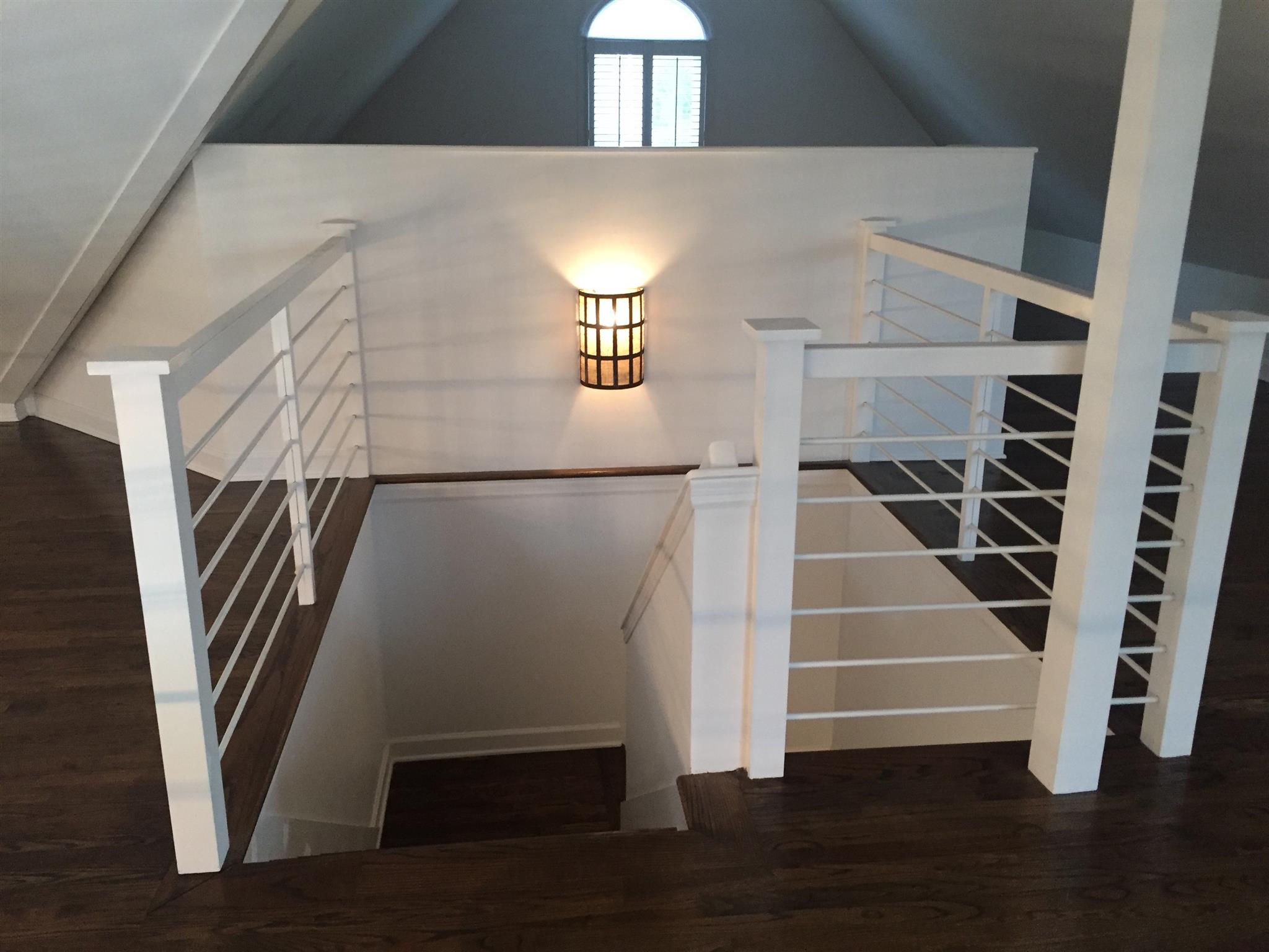 9366 Hester Beasley Road Nashville, TN 37221 - Photo 22 of 29 Hardwood Stairs with Painted Risers Lead From the Main Floor to the Second Floor Loft, Office, and Bedroom!
