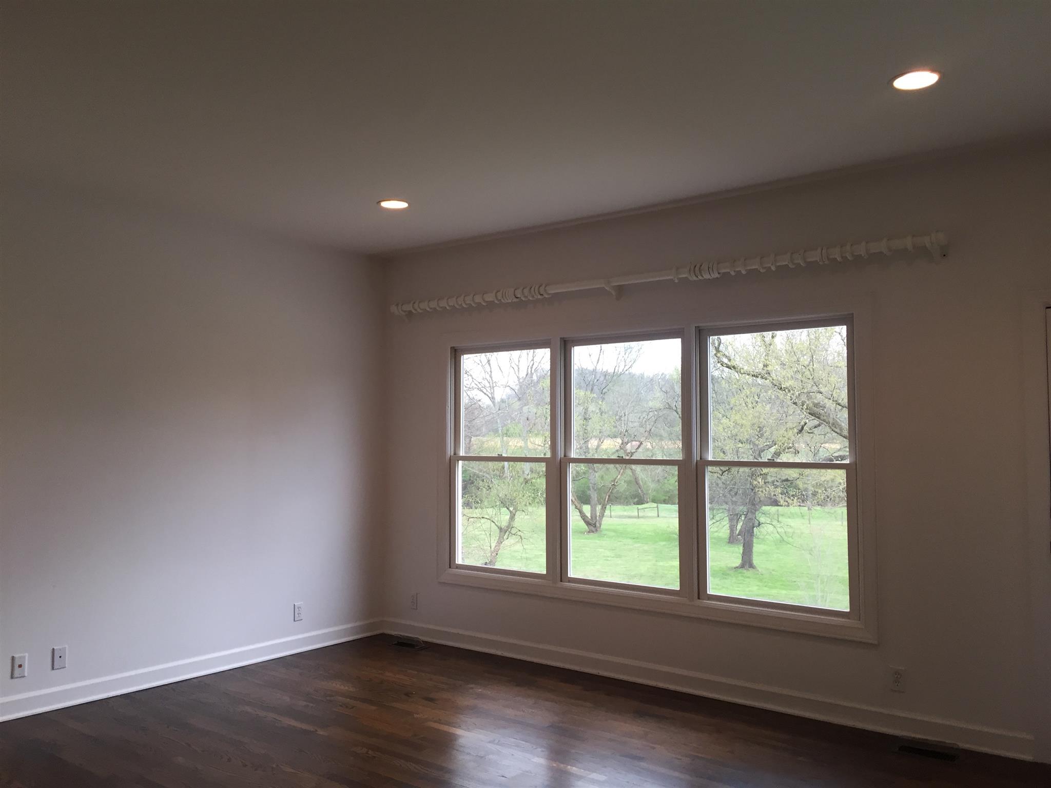 9366 Hester Beasley Road Nashville, TN 37221 - Photo 10 of 29 The Mater Bedroom Offers Incredible, Private Views of the Land Down to the River! Hardwood Floors and Recessed Lights are Perfect and there is a Door to the Deck too!