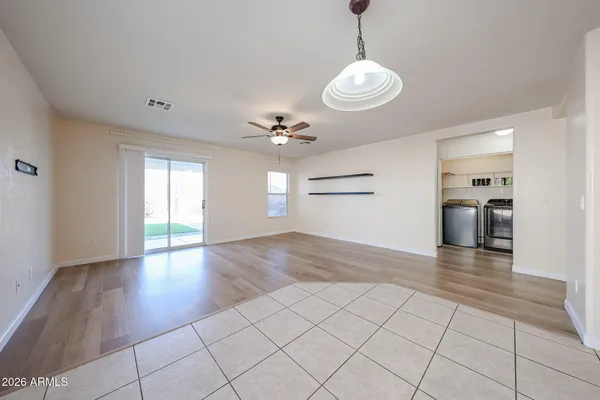 a view of livingroom with kitchen