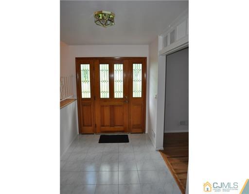 1 Agate Road East Brunswick, NJ 08816 - Photo 2 of 25 a view of front door