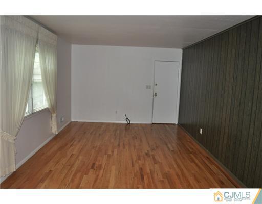 1 Agate Road East Brunswick, NJ 08816 - Photo 13 of 25 a view of an empty room and window