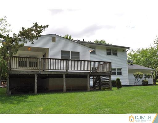 1 Agate Road East Brunswick, NJ 08816 - Photo 16 of 25 a view of a house with a backyard