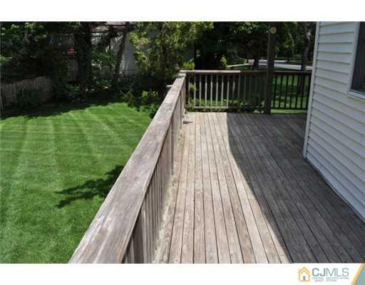 1 Agate Road East Brunswick, NJ 08816 - Photo 17 of 25 a view of balcony with a garden