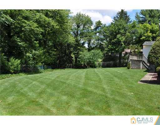 1 Agate Road East Brunswick, NJ 08816 - Photo 20 of 25 a view of a backyard with a garden