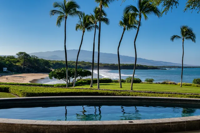a view of a yard with a table and chairs