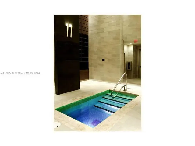 a living room with a rug