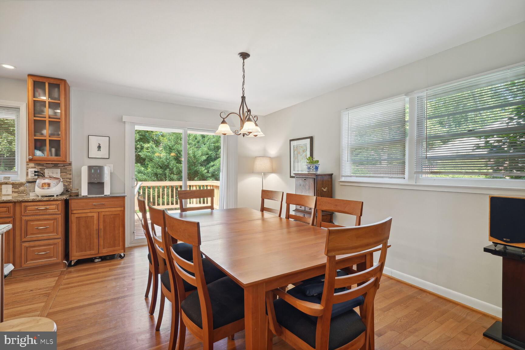 7011 Hector Road McLean, VA 22101 - Photo 6 of 20 a dining room with furniture window wooden floor