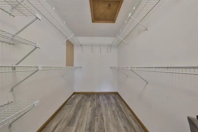 a view of a room with racks on the wall