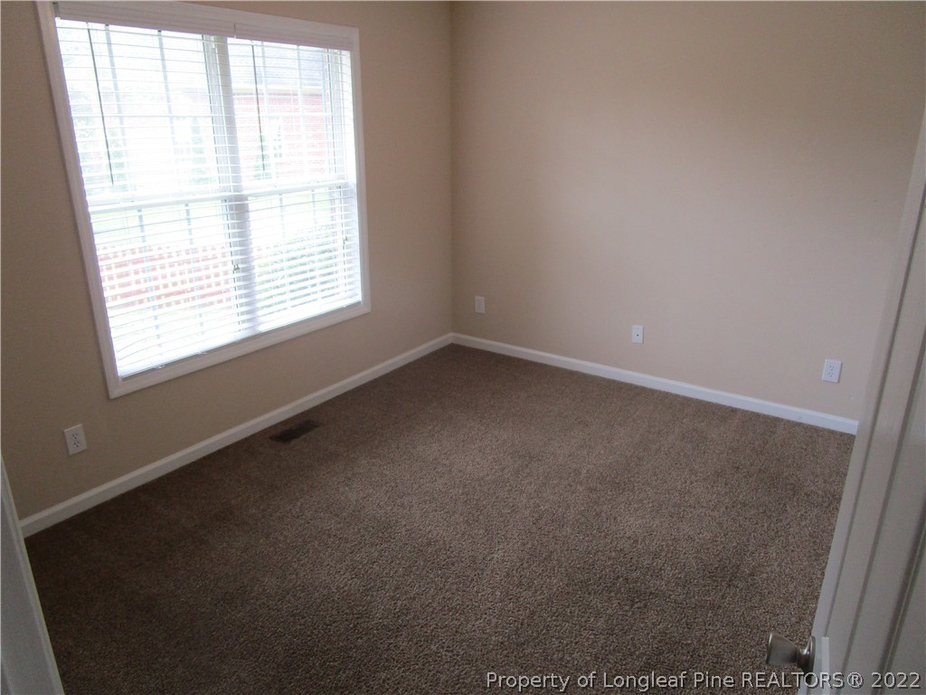 4328 Rocinta Court Hope Mills, NC 28348 - Photo 22 of 39 an empty room with a window