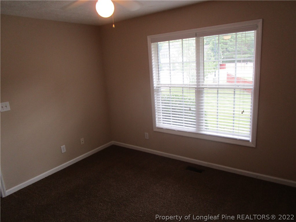 4328 Rocinta Court Hope Mills, NC 28348 - Photo 24 of 39 a view of an empty room with a window
