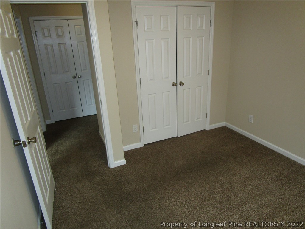 4328 Rocinta Court Hope Mills, NC 28348 - Photo 26 of 39 an empty room with wooden floor
