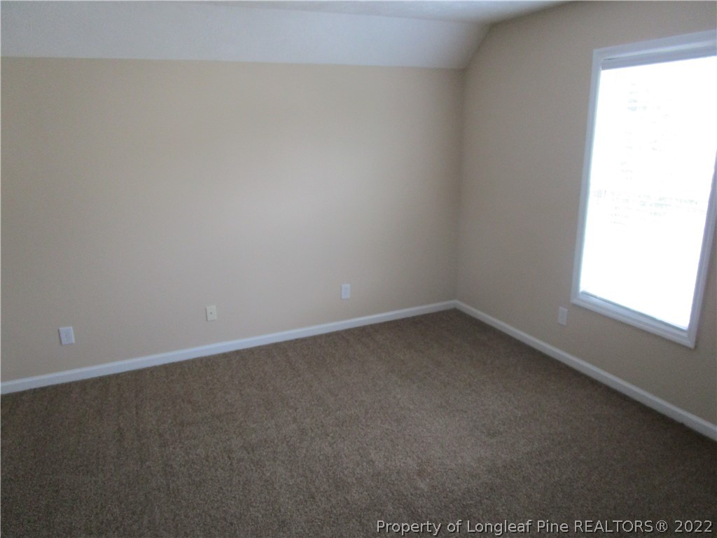 4328 Rocinta Court Hope Mills, NC 28348 - Photo 33 of 39 a view of an empty room and window