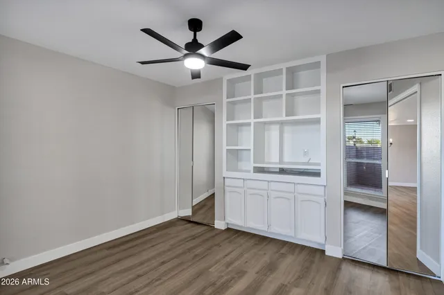 a workspace with furniture and window