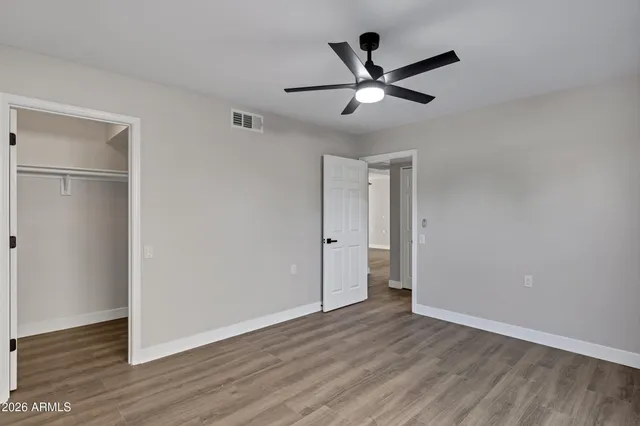a bathroom with a sink toilet and a mirror
