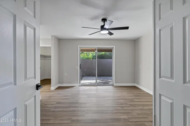 a bedroom with bed and a couch