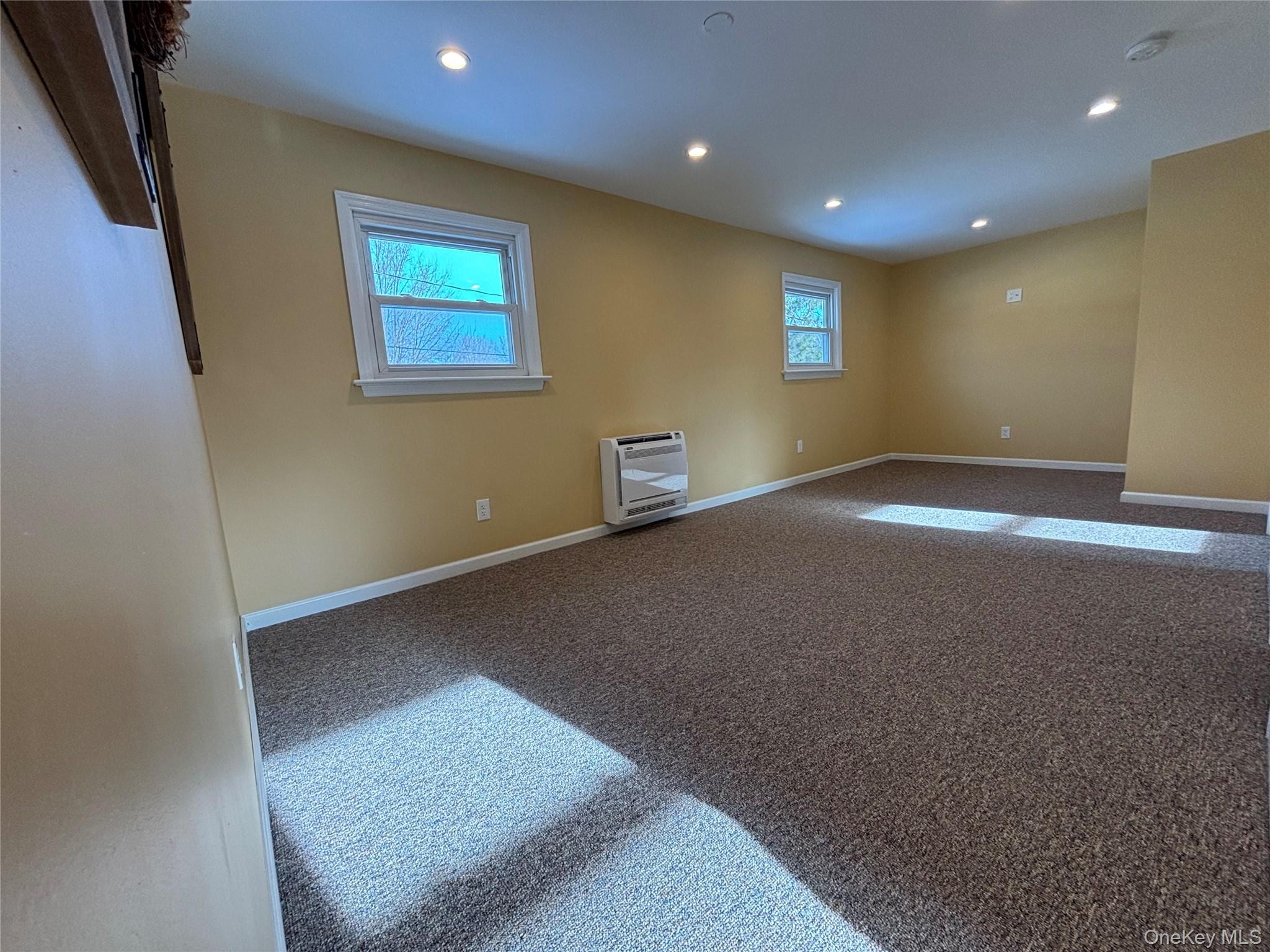 45 Waterstone Road, Unit 2 Greenwood Lake, NY 10925 - Photo 5 of 10 a view of an empty room with a window