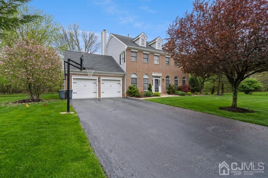 11 Tree Farm Road Monmouth Junction, NJ 08852 - Photo 2 of 27 a front view of house with yard and green space