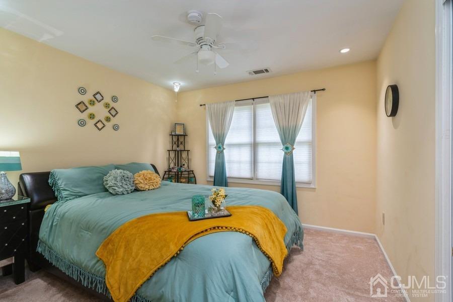 11 Tree Farm Road Monmouth Junction, NJ 08852 - Photo 21 of 27 a bedroom with a bed and a window