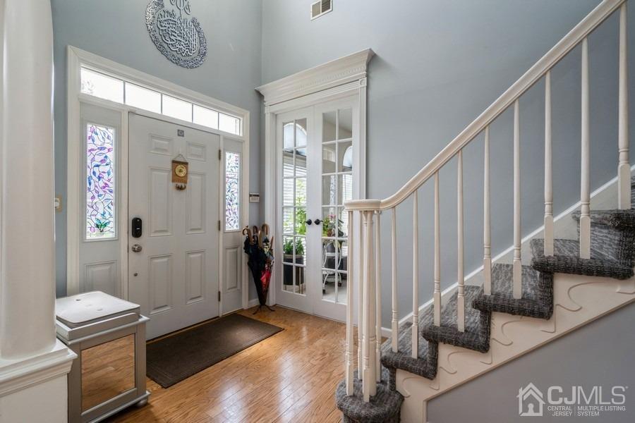 11 Tree Farm Road Monmouth Junction, NJ 08852 - Photo 25 of 27 a view of entryway with wooden floor