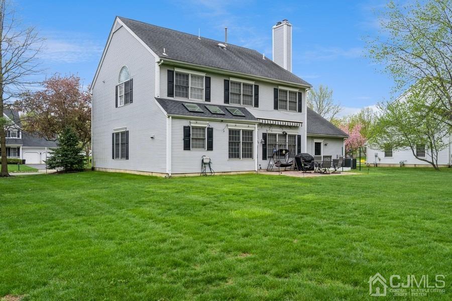11 Tree Farm Road Monmouth Junction, NJ 08852 - Photo 3 of 27 a front view of house with yard and green space