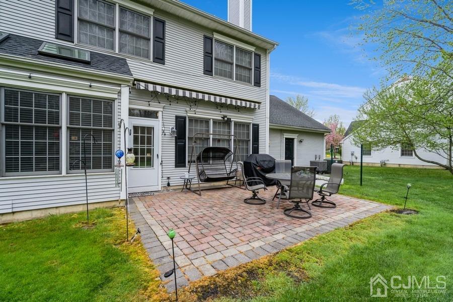11 Tree Farm Road Monmouth Junction, NJ 08852 - Photo 5 of 27 a view of a house with backyard sitting area and garden
