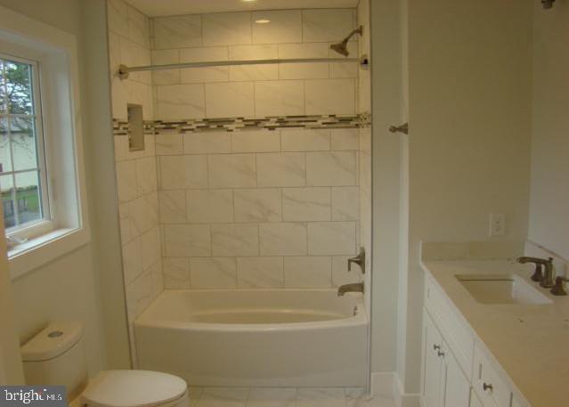 1520 Webster Place Edgewater, MD 21037 - Photo 16 of 20 a bathroom with a shower a toilet and sink