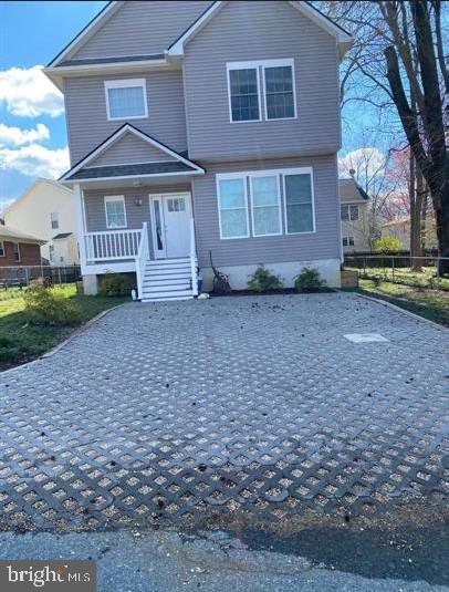 1520 Webster Place Edgewater, MD 21037 - Photo 2 of 20 a front view of a house with garden