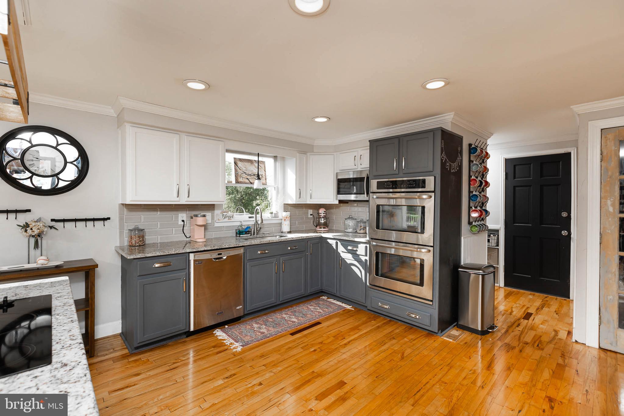 4825 Cap Stine Road Frederick, MD 21703 - Photo 7 of 52 Kitchen is open to both DR and FR