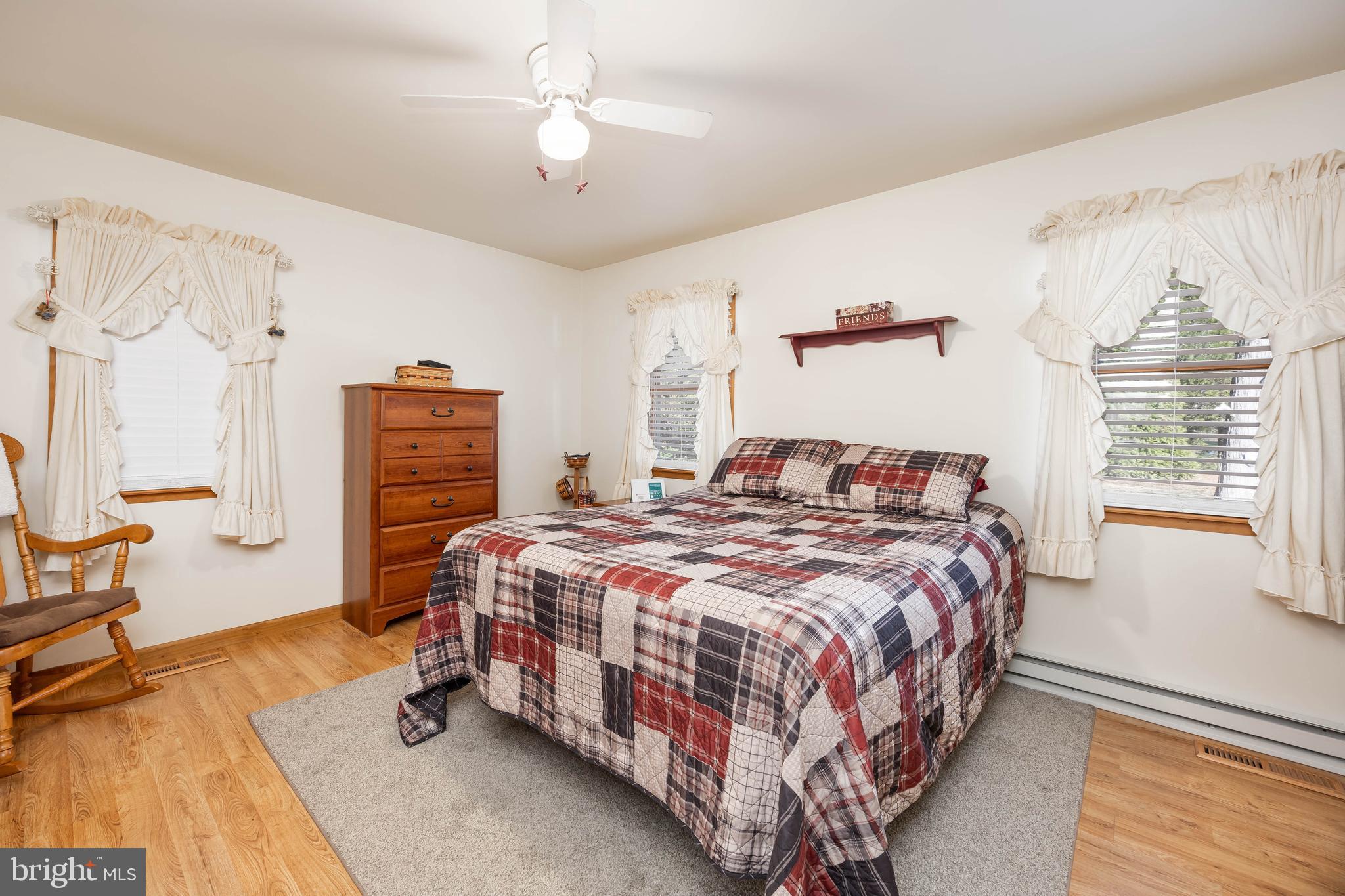 911 Outten Road Salisbury, MD 21804 - Photo 13 of 36 a bedroom with a bed and a window