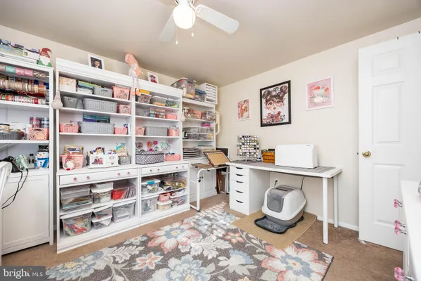 a view of a street with a building in the background