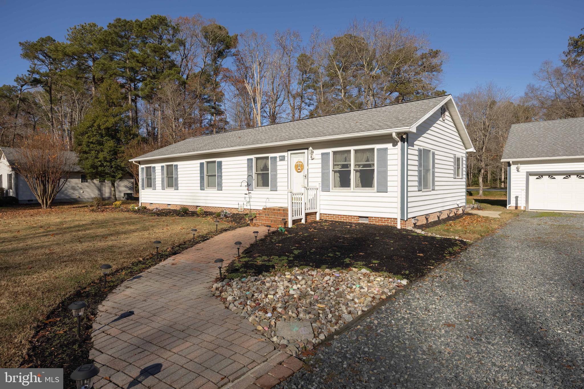 911 Outten Road Salisbury, MD 21804 - Photo 31 of 36 a front view of a house with a yard