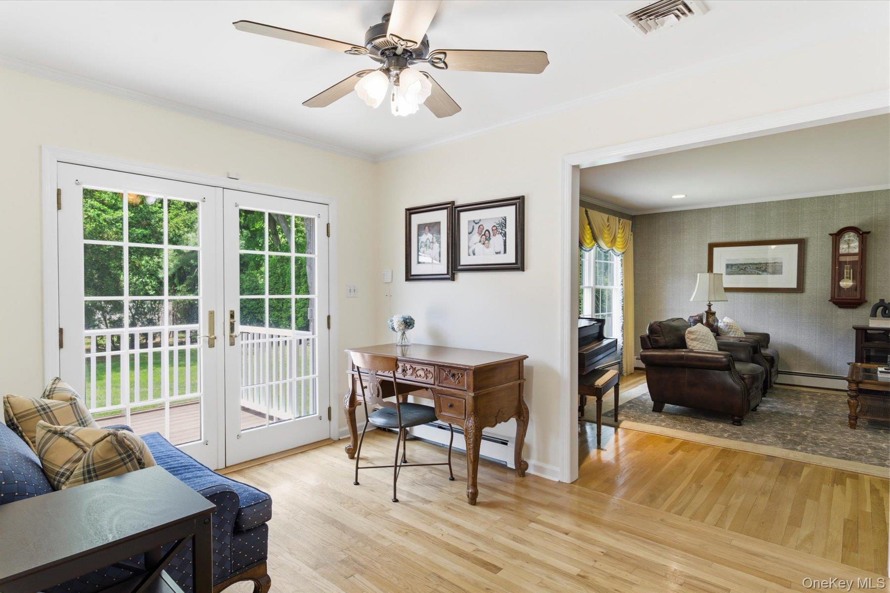 6 Brandy Road Cold Spring Harbor, NY 11724 - Photo 11 of 25 a living room with furniture and a wooden floor